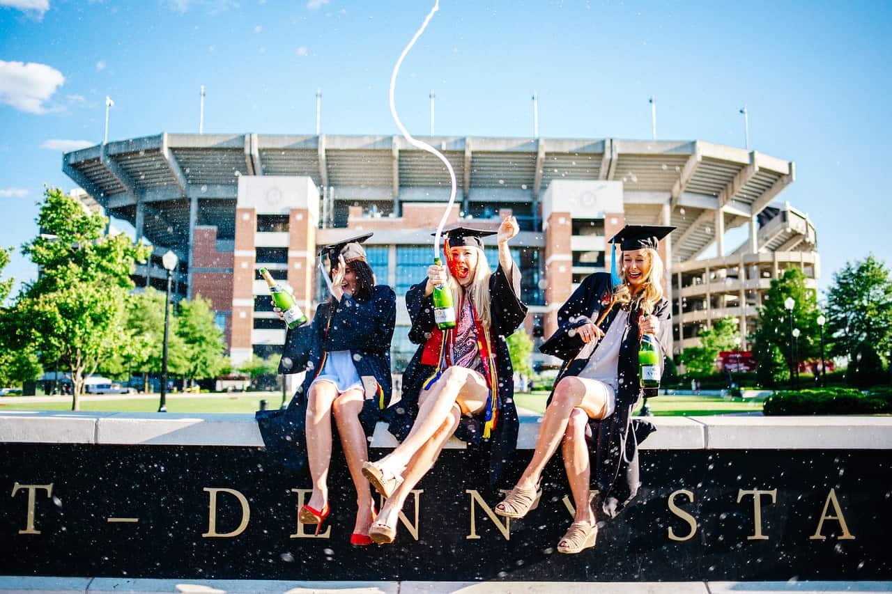 Three girls celebrating their graduation